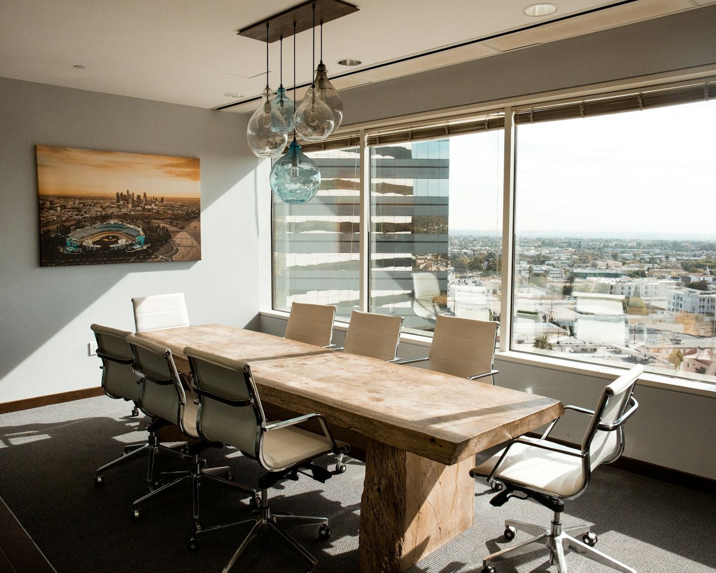 A quiet meeting room with a long table